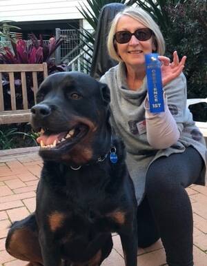Alexis and Rocky and their first place ribbon for Obedience training. Picture: supplied 