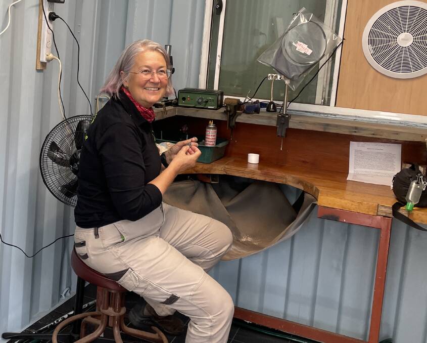 Narooma Men's and Community Shed member Rachel McInnes with jewellery-making equipment. Picture by Marion Williams