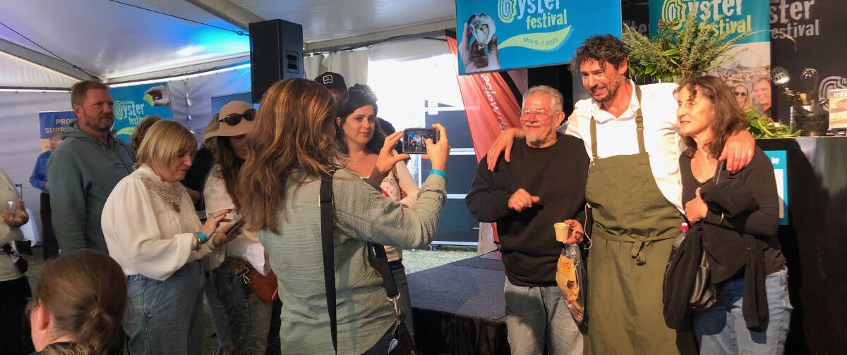After his cooking demo, there were huge queues to get a photo with celebrity chef Colin Fassnidge at Narooma Oyster Festival 2023. Picture by Marion Williams.