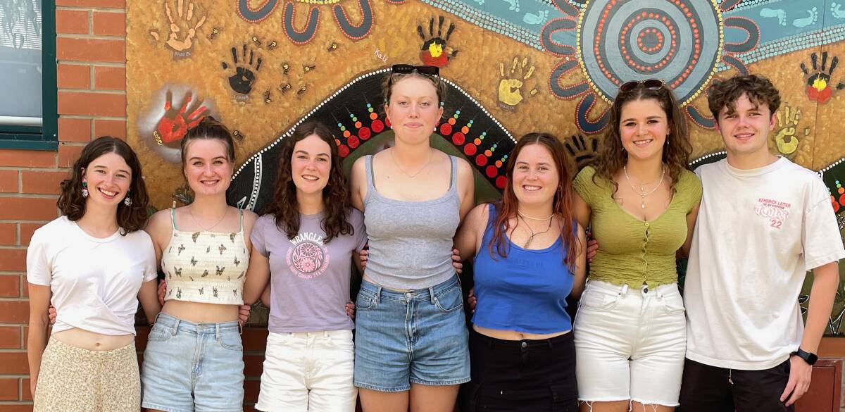Narooma High School students Stephanie Ovington, Emma Bevington, Ruby Efraemson, Lucy Badman, Ella Hemsted, Yeshe Smith Macpherson and Jack Lenihan on Thursday, December 14, after receiving their HSC and ATAR results. Picture by Marion Williams