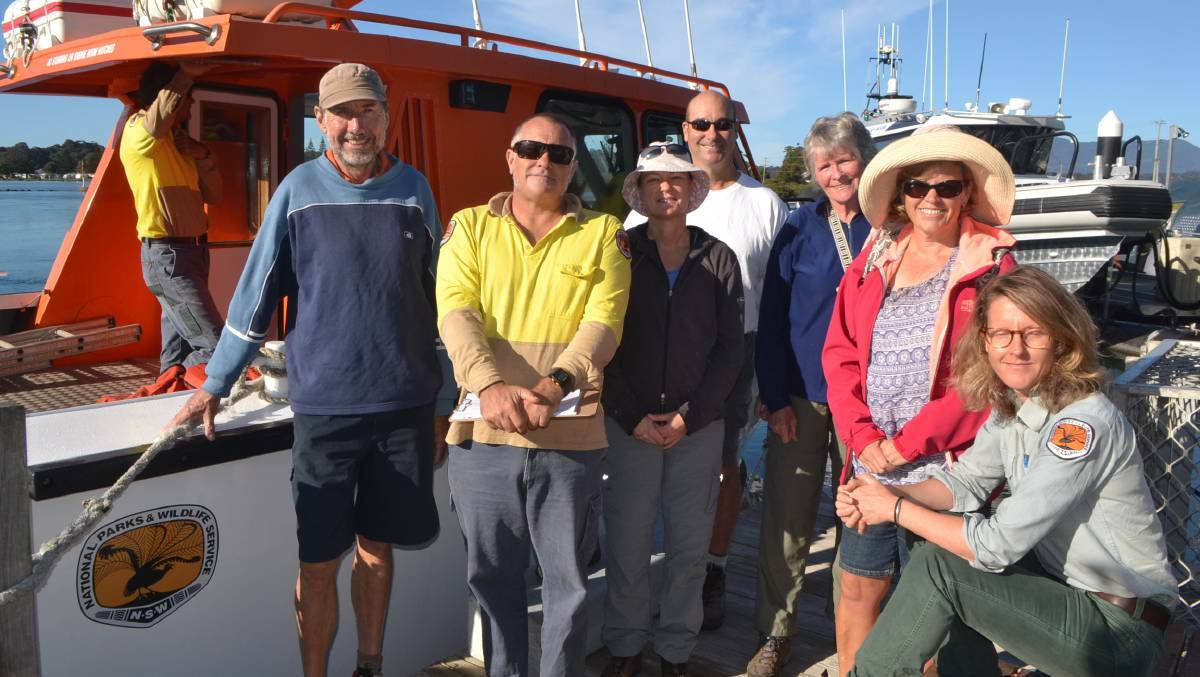 Montague Island Discovery coordinator Cassandra Bendixsen (right) with the first group of eco volunteers heading out in 2016. File picture