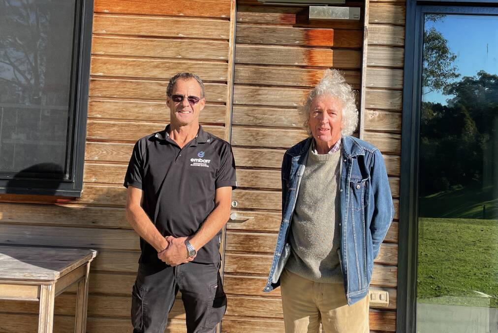 Bill Southwood (right) asked the plumber to find a way to automate Four Winds' sprinkler system. That led them to the Embarr Argus system. Embarr founder/CEO Graham Pole (left) installed the system on Tuesday, June 20. Picture by Marion Williams