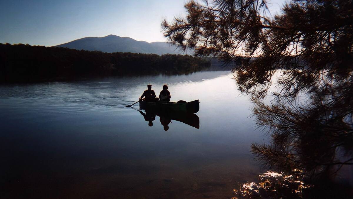 Tony King and Kris Ralph paddle around Wallaga Lake in their canoe when they want inspiration. Picture supplied