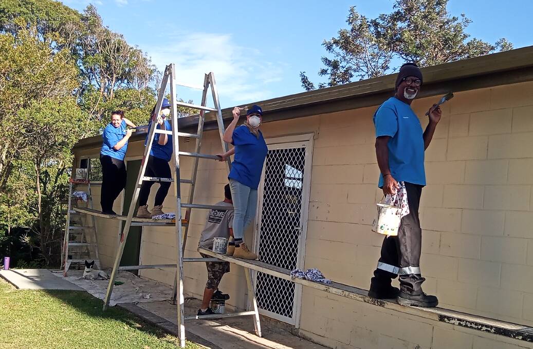 Some of the volunteers who repainted the exterior of Monty's Place in Narooma in the week of March 11. Picture by Reverend Karen Paull