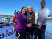 Fiona Phillips MP, Max Castle and Eurobodalla Shire mayor Mat Hatcher cut the ribbon on the upgraded Tuross Head jetty
