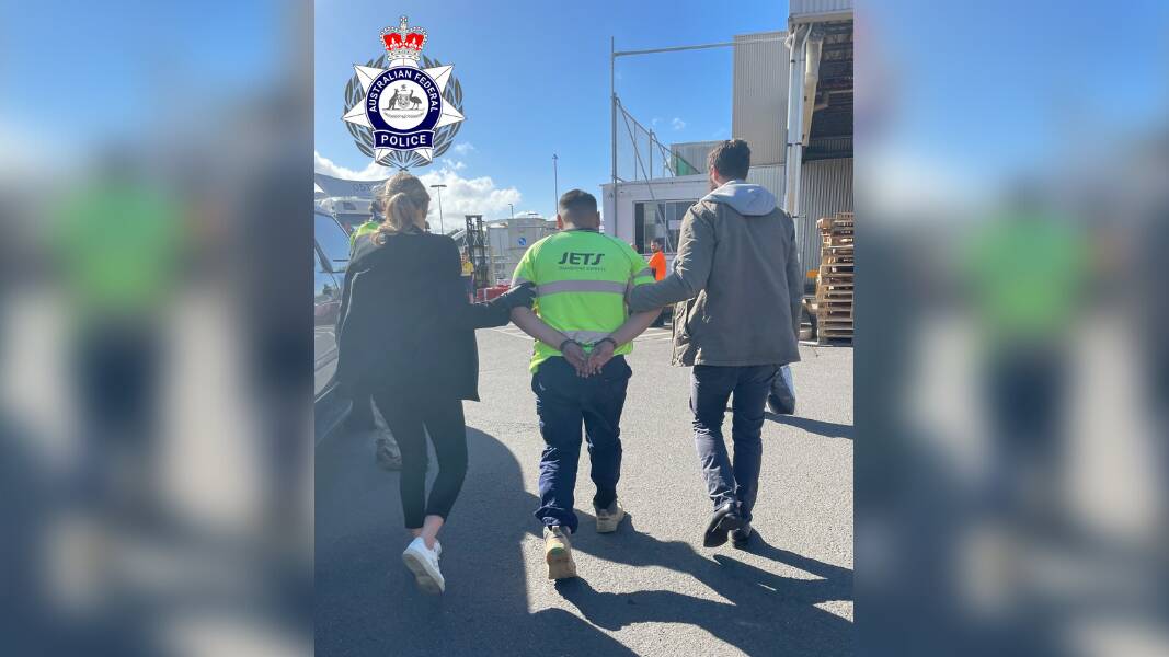 AFP with one of five men arrested over the alleged drug importation plot. Picture via AFP