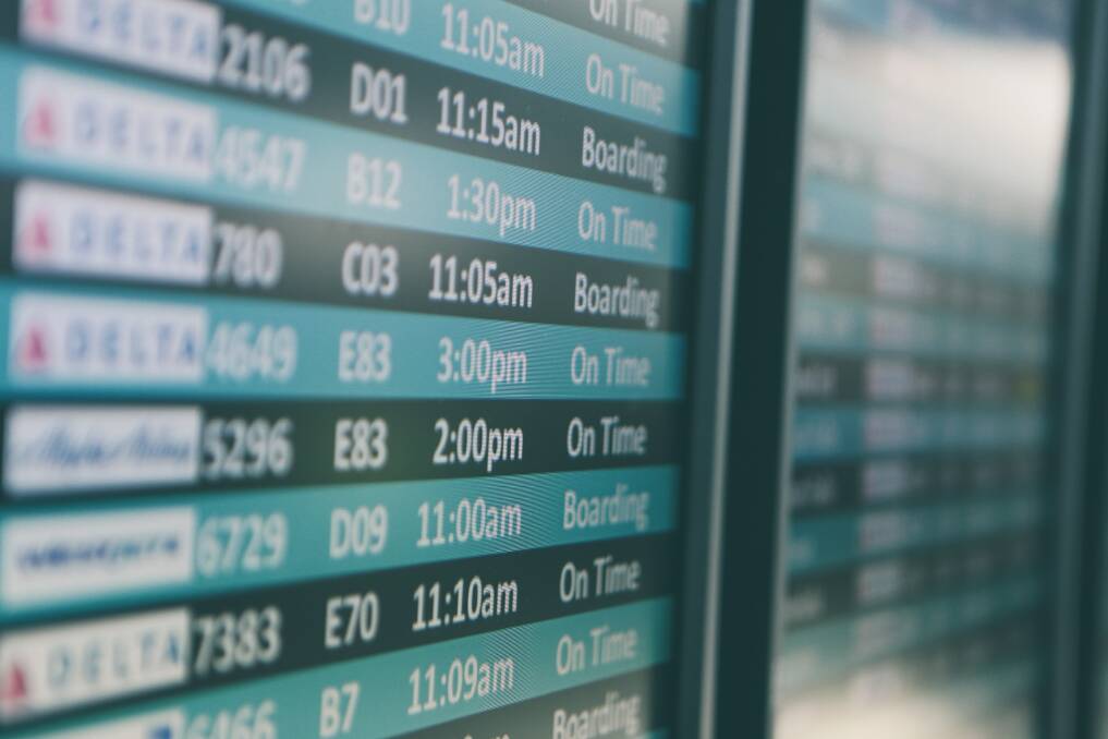Airport departures timetable. Picture from Unsplash. 
