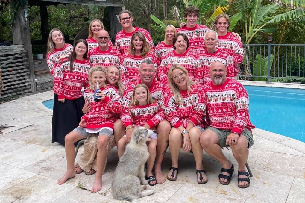 John Smith celebrates Thanksgiving with family members - all in matching tops. Picture supplied.