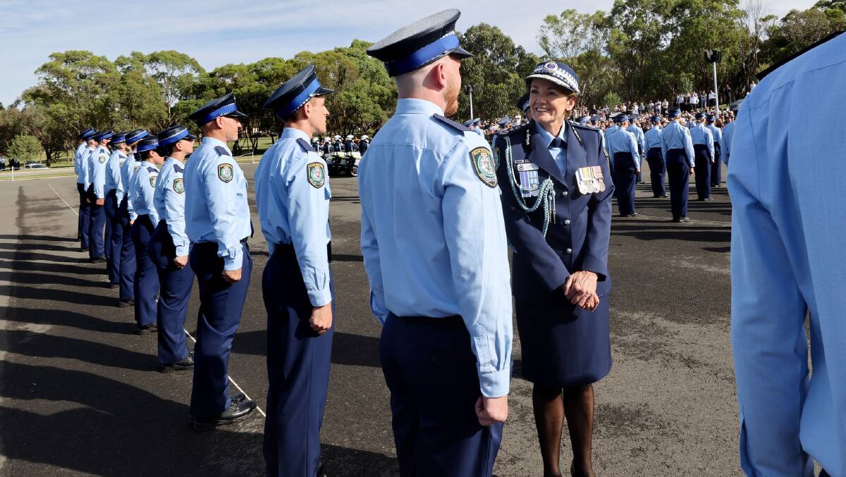 NSW Police Commissioner, Karen Webb, inspects the troops during the graduation ceremony today. Picture supplied.