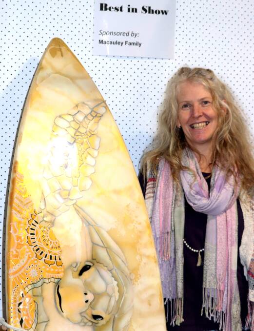 WAVE OF SUCCESS: Natasha Marie Kalenjuk won the MACS art prize with her surfboard and has thanked her art-loving community.