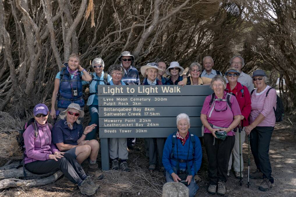 LIGHT TO LIGHT WALK: An enthusiastic group gathered at the start of the walk - and maintained their light spirits.