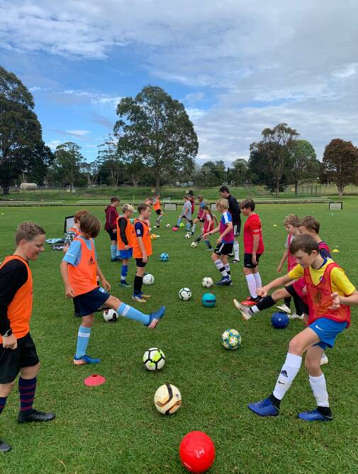 KICK STARTING RECOVERY: A free soccer clinic in Moruya helped lifted the spirits of kids after the bushfires.