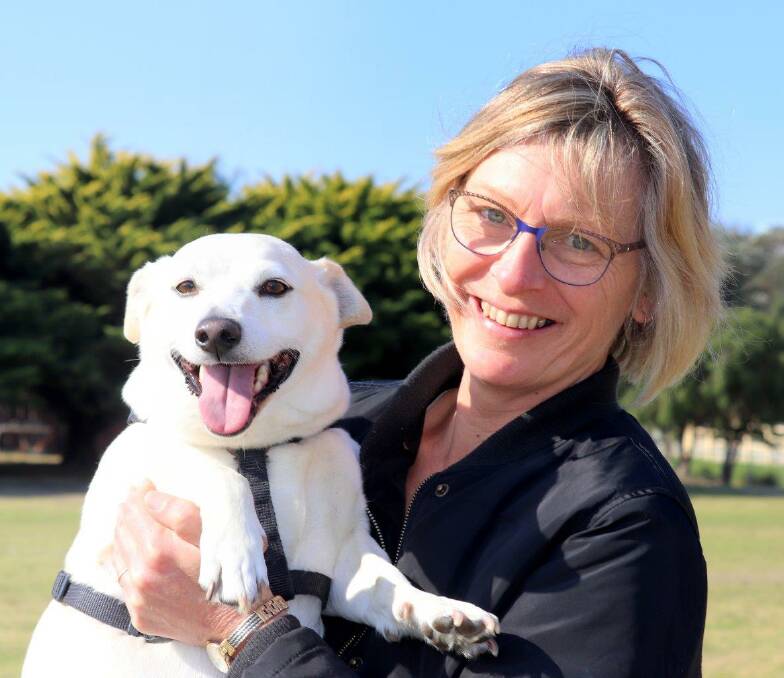 BACK TO SCHOOL: Narooma Vet nurse Kate Sutherland with Dusty. They are both doggie school regulars.