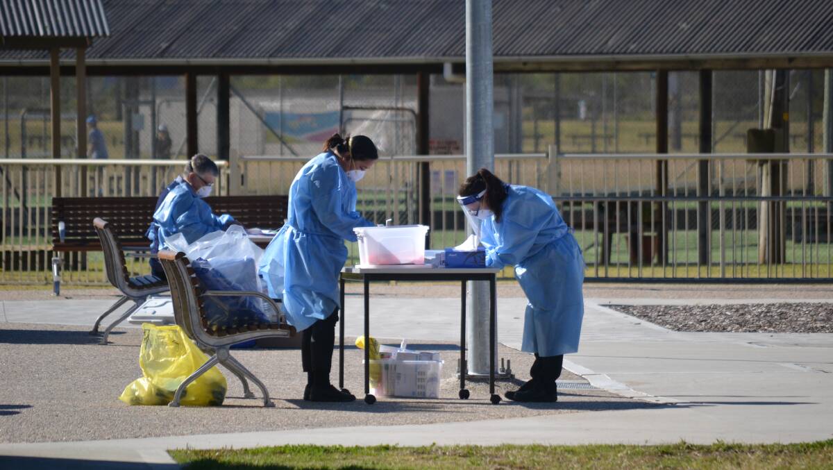 Stuart Thomson's picture of Eurobodalla Shire health staff at a testing clinic.