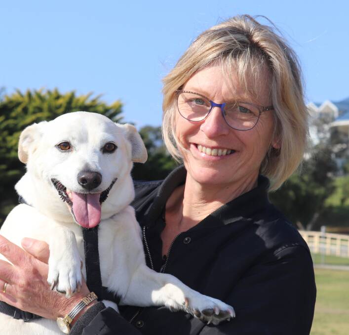 HAPPY LIFE: Dusty with his 'mum' Kate Sutherland, who rescued him after a horrific start to life.
