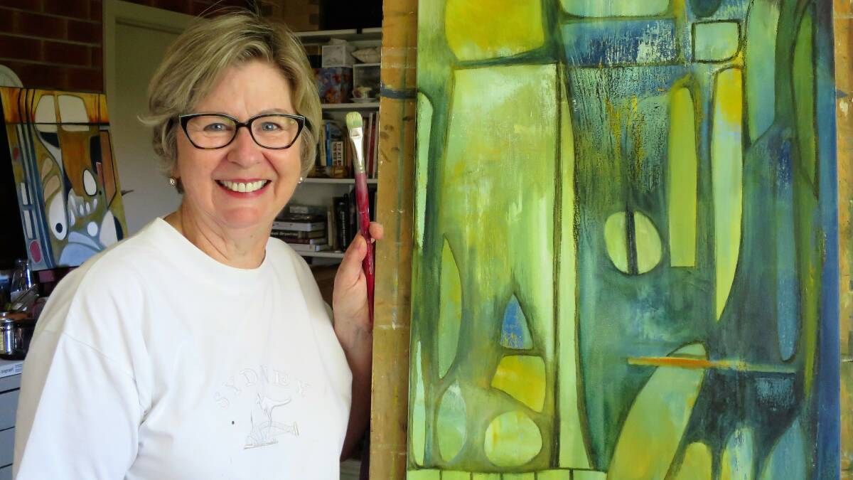 SHADES OF GREEN: Ann Rogan with one of her works that will feature in the SoART 
Gallery exhibition opening 17 January.