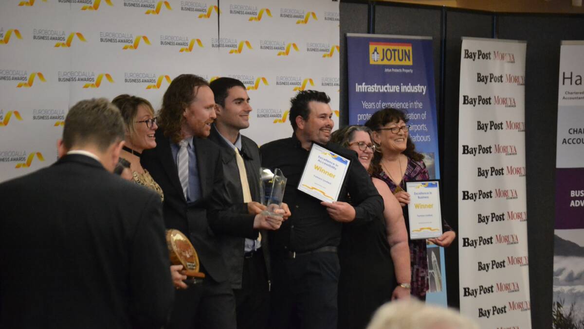 GRINNING: Moruya service Yumaro was awarded the Excellence in Business and Excellence in Accessibility awards in August - and has just won the regional award.