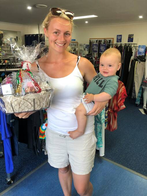Romy Wright was delighted to win the Vinnies Narooma Christmas raffle.