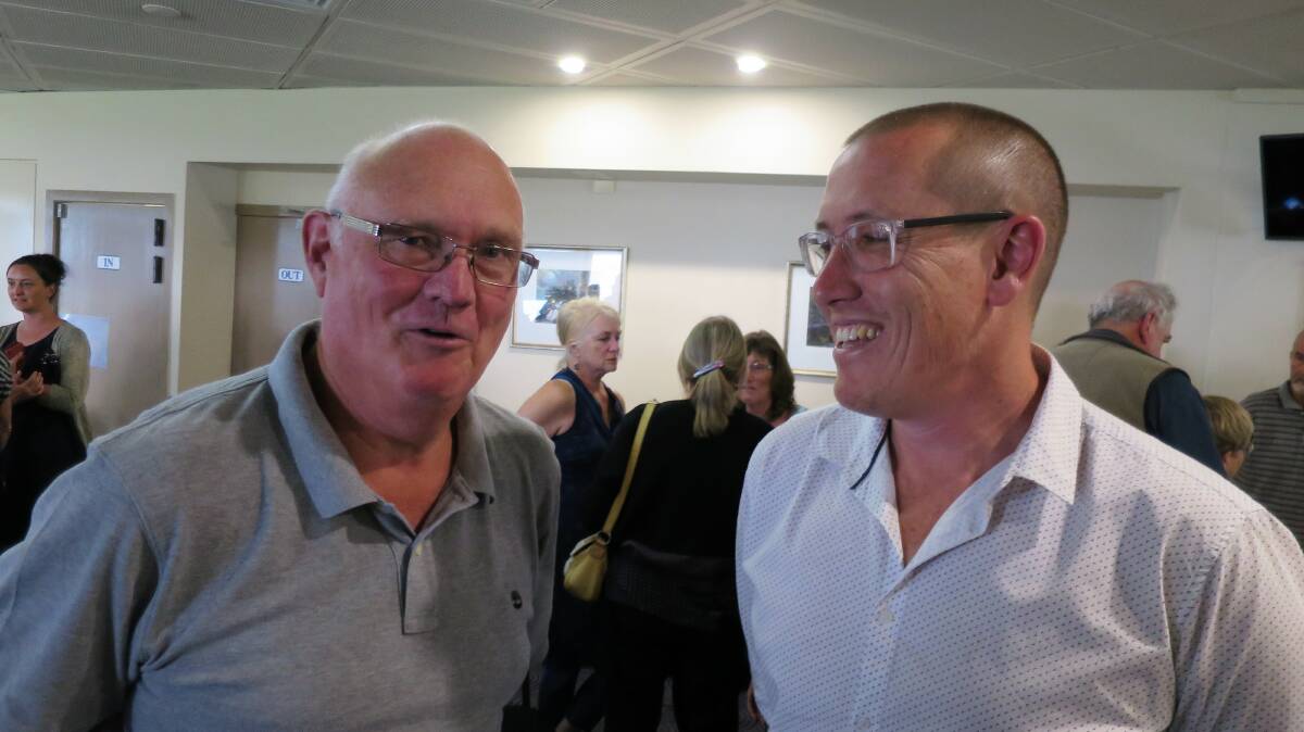 Narooma School of Arts committee member Bob Aston and the independent meeting facilitator Ian Campbell.