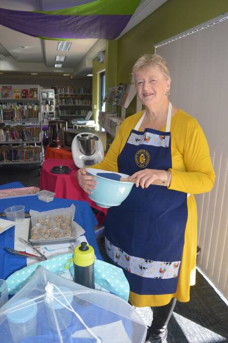 COOL COOK: CWA's Suzanne Hancock demonstrates the delights of no-bake sweets at Narooma Library.
﻿