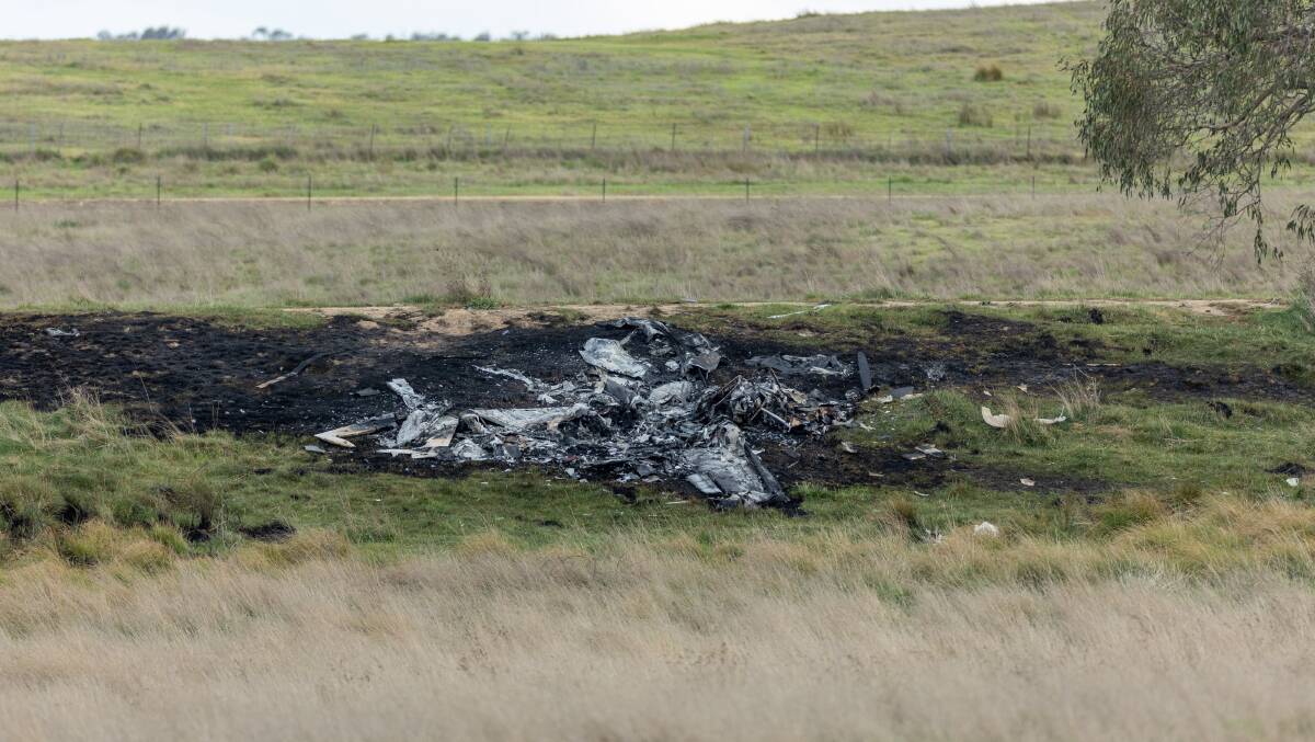 The remnants of a light plane which crashed at Gundaroo on Friday afternoon. Picture by Gary Ramage