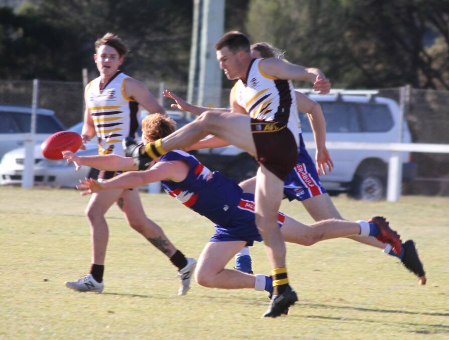 BLUSTERY: The Pambula Panthers made the best of the final quarter to sneak home over the Merimbula Diggers after a tight contest in windy conditions at Eden.