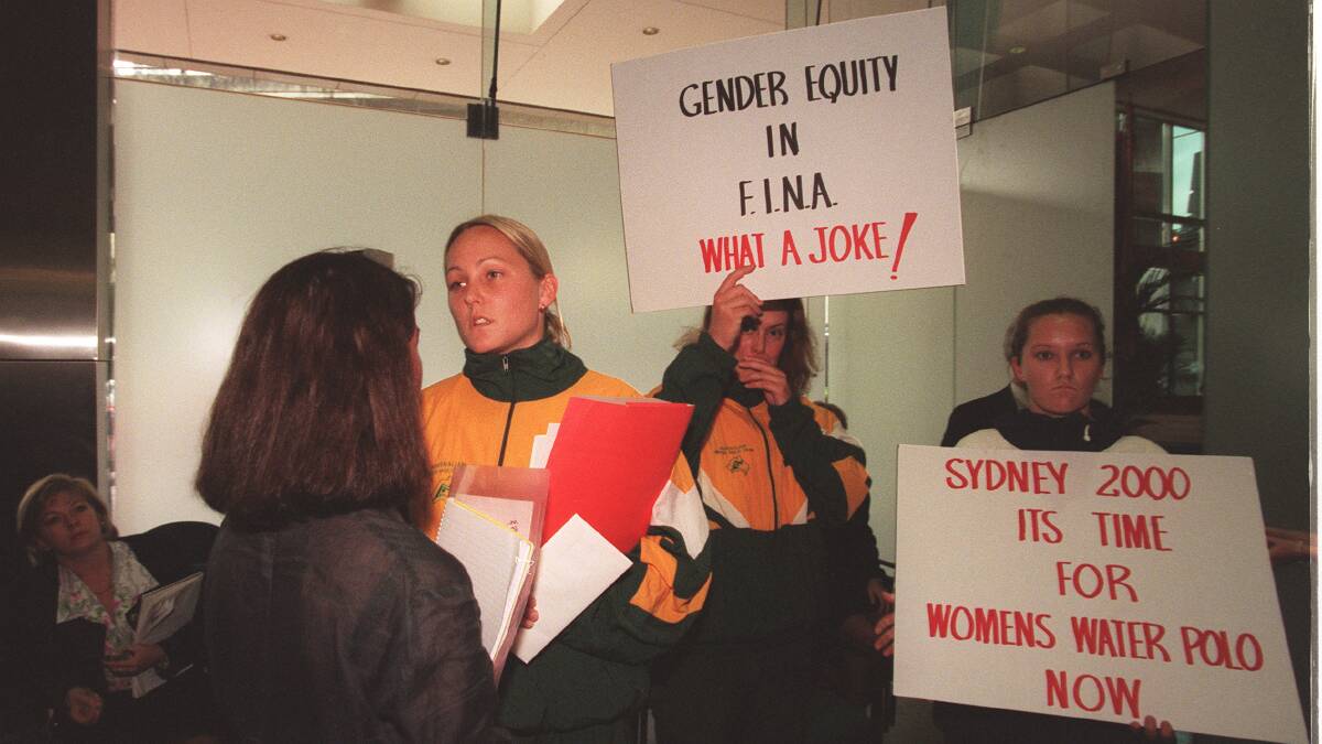 In September 1997 members of the Australian women's water polo team protest at an IOC Coordination Commission press conference. Photo: Peter Rae