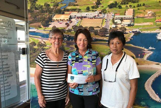 BERMAGUI LADIES: Monthly medal winner Lynn Ponsford with sponsors Pat Whitty and Anna Blacka.