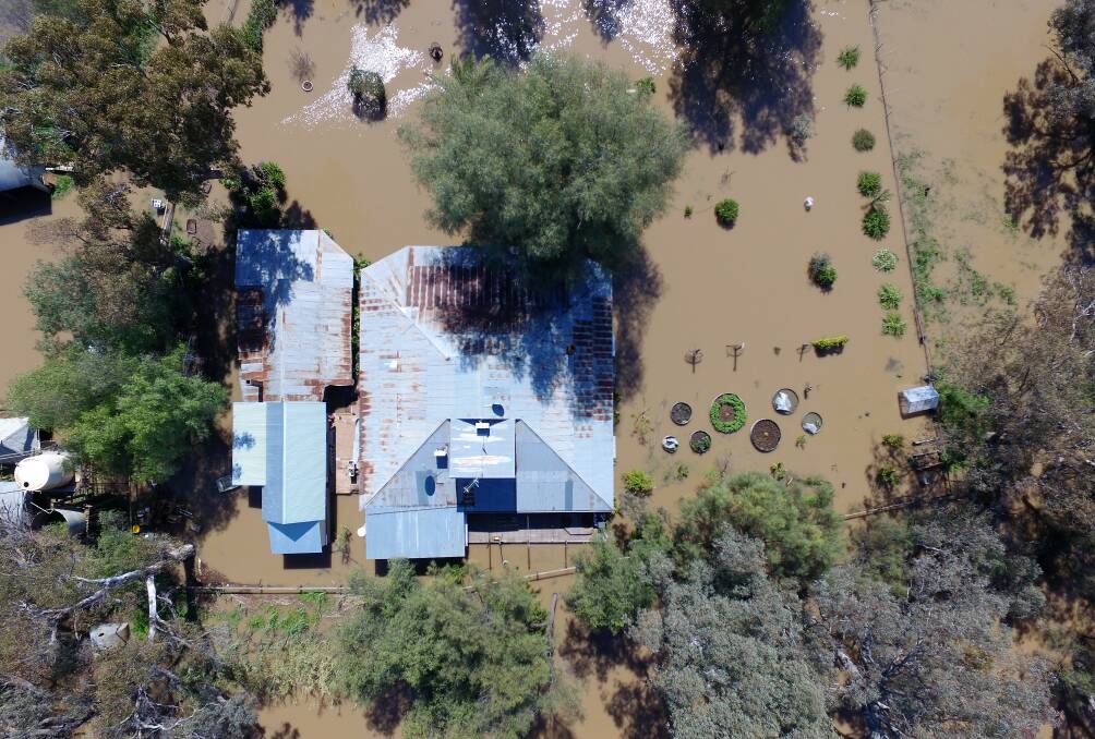MY ISLAND HOME: Flooding has become a daily reality for Angie and Mike Armstrong at their property Callubri. Photo: CONTRIBUTED.