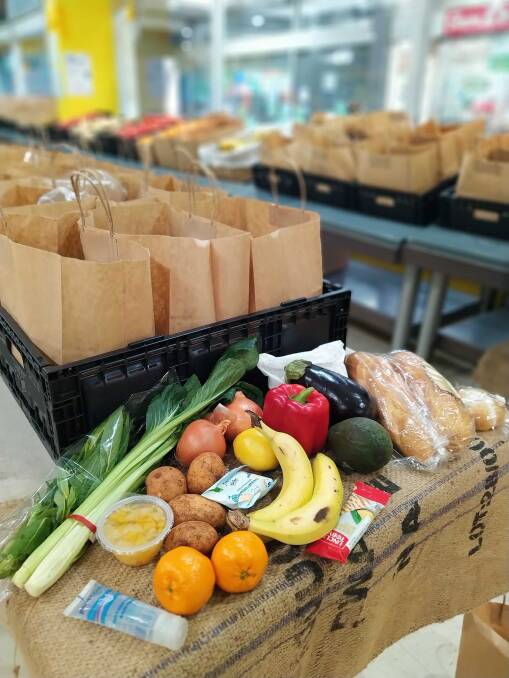 Basic supplies packed into hampers. Image: OzHarvest Facebook.