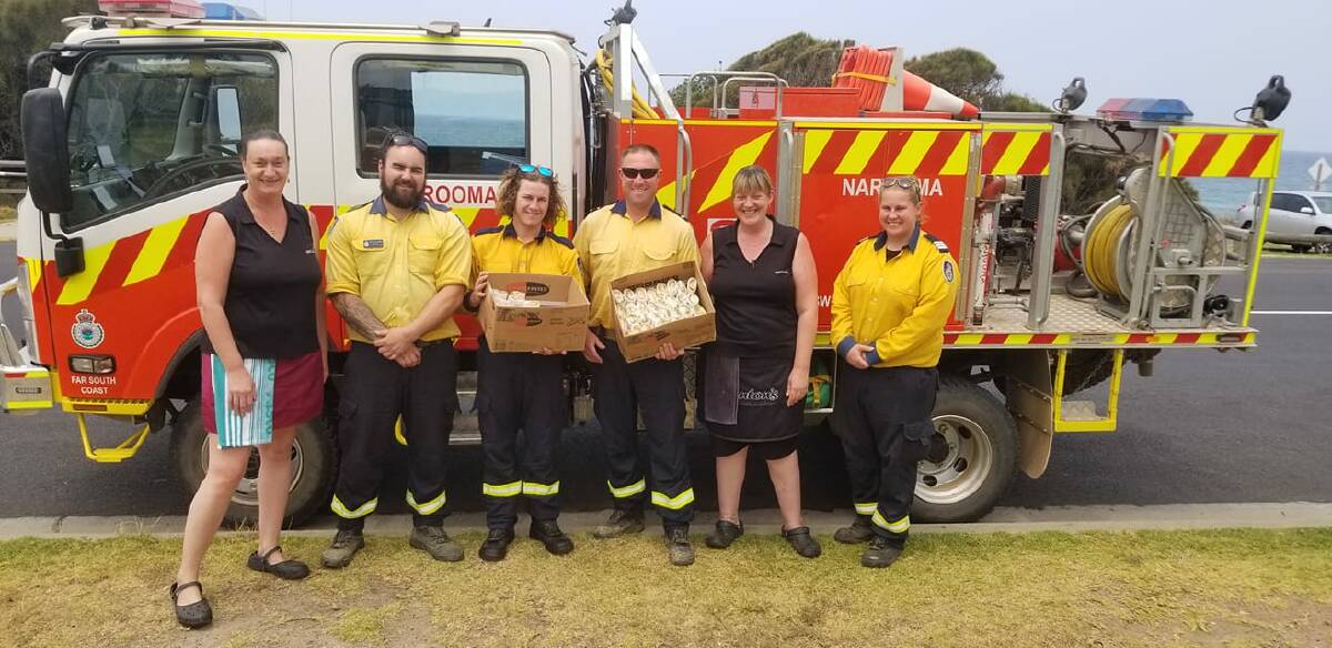 Volunteers with donated goods from Anton's Cafe. Image: Facebook. 