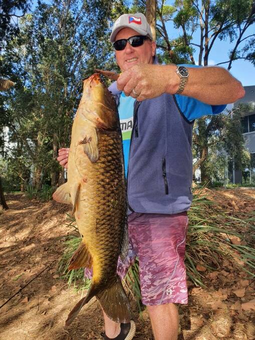 Narooma Sport and Gamefishing Club member Ben James with a healthy European Carp, caught near Sydney Airport. The Carp measured 67cm.