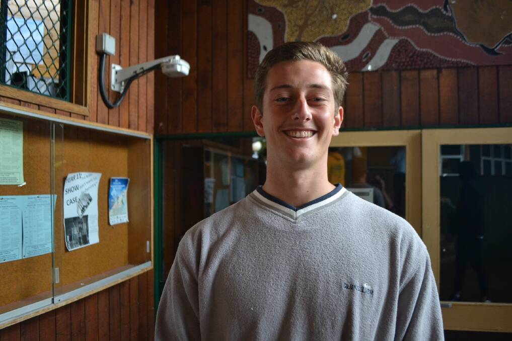 Liam Russell of Bermagui cheering as he finished his first exam. 