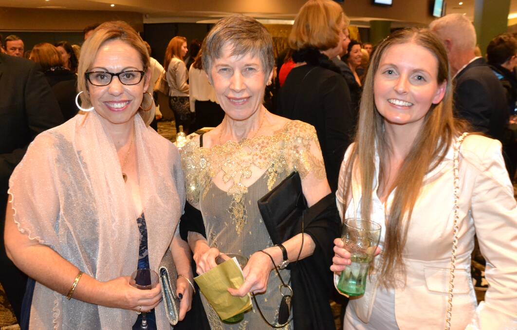 Narooma Dreaming: Di Riley, Jenny Munro and Cherie Cunninghame of the Narooma Chamber of Commerce at the Eurobodalla Business Awards on Saturday.