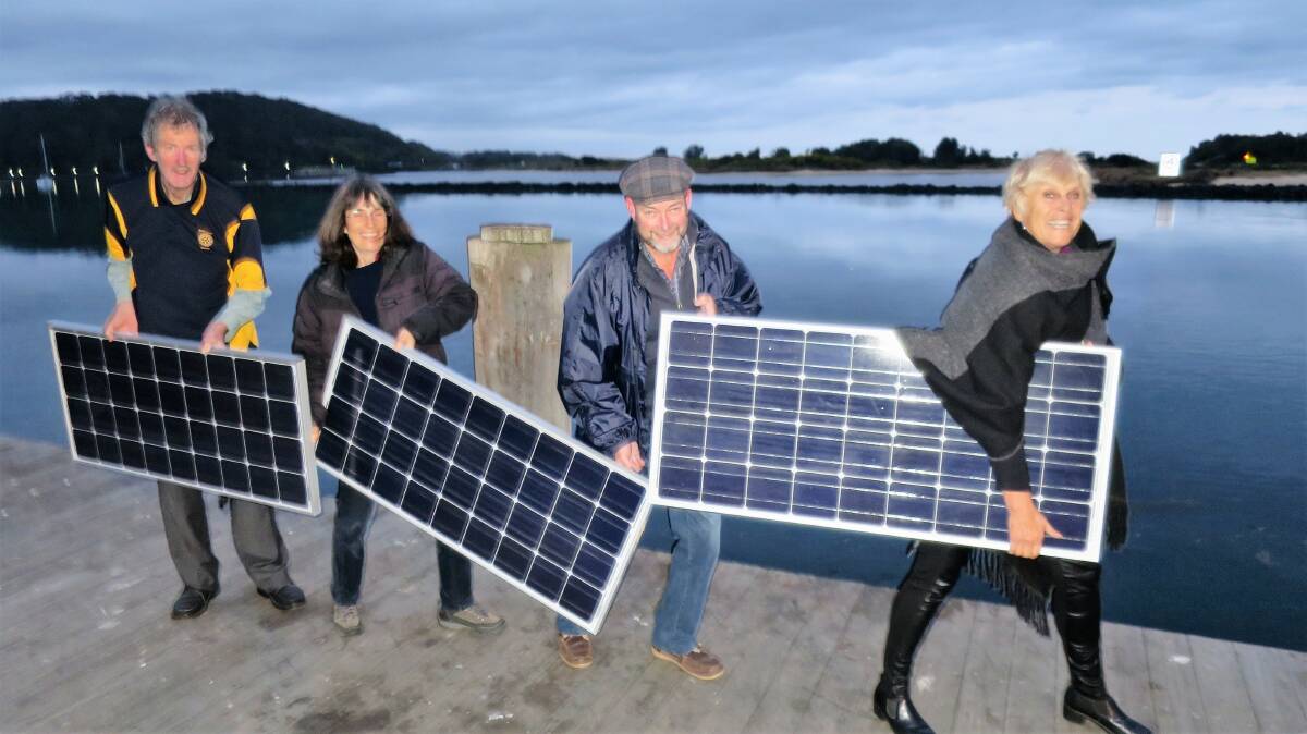 Getting ready for the Narooma Renewable Energy Expo are Rotary coordinator Frank Eden, Iris Domeier, Rolf Gimmel and Ange Ulrichsen.