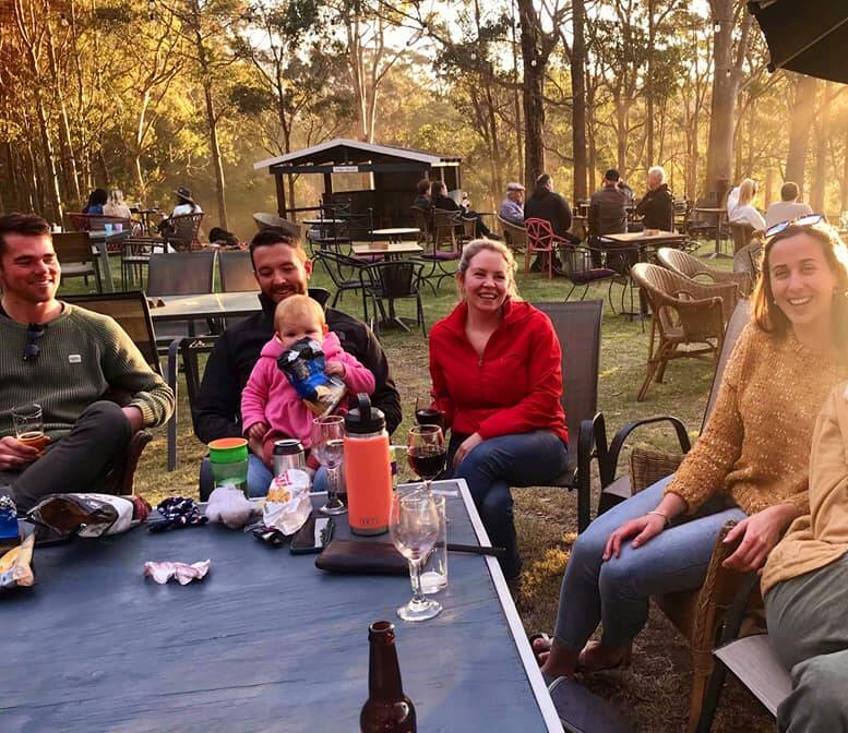 Family and friends enjoy a Sunday session with live music at the Tilba Valley Winery & Ale House. 