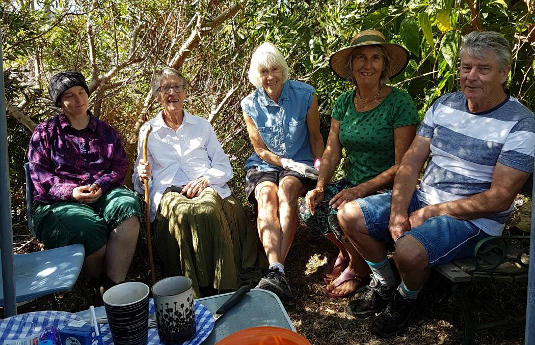 Green thumbs: Alana Baker, Sandy Costello, Bauxi Wieland, Robin McLauchlan and Wayne Redmond enjoy morning tea and a chat at the Community Garden at the Narooma Public School.