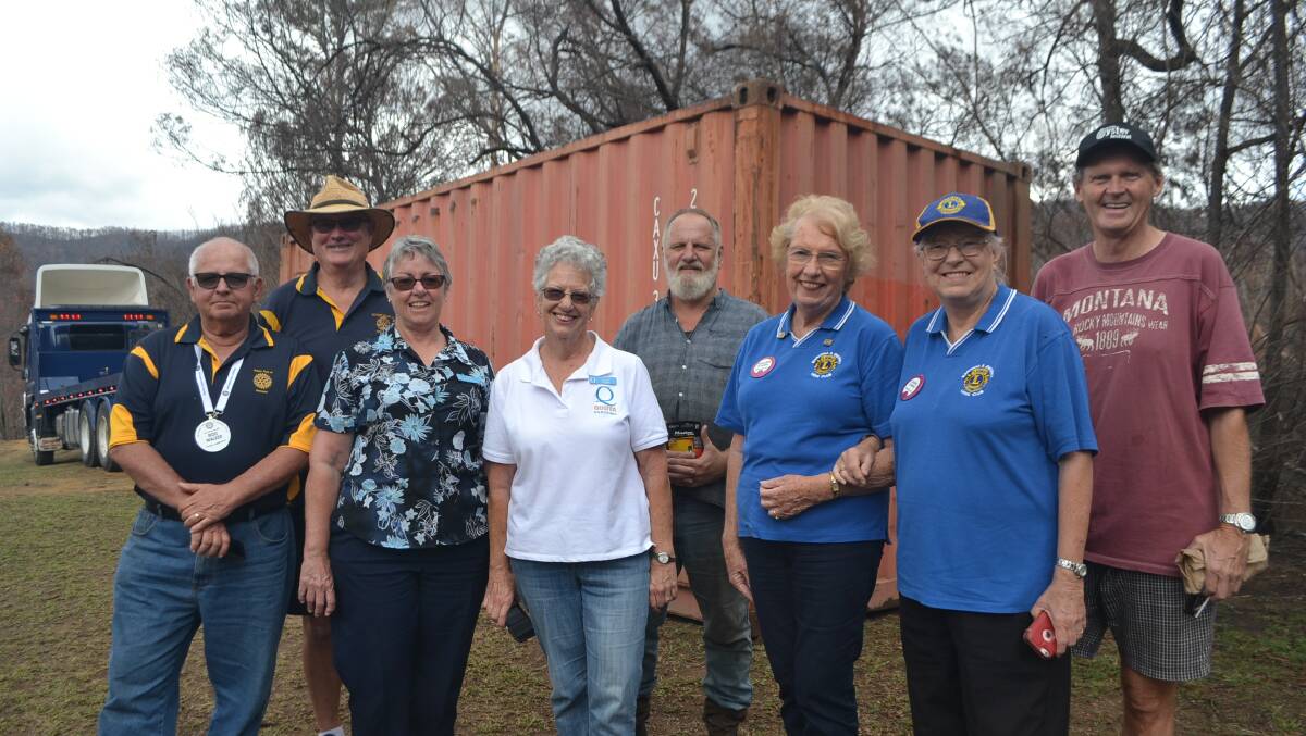 Narooma Quota, Lions and Rotary members with Councillor Lindsay Brown and Ron Threlfall on Friday after delivering a big gift to help Nerrigundah heal.