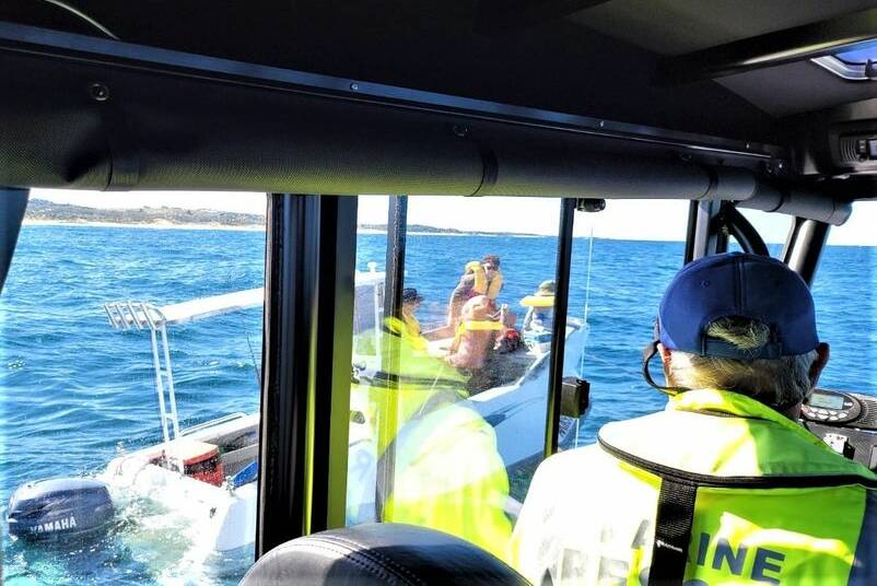 Volunteers quickly respond to a call for help from a family of five stuck off the coast near Tuross Head. Image: Marine Rescue NSW.