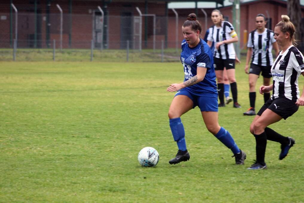 Netting goals: Peta Cottington of Moruya South Head gets a kick out of playing for the Southern Branch representative side. Image: Freddie Simon. 