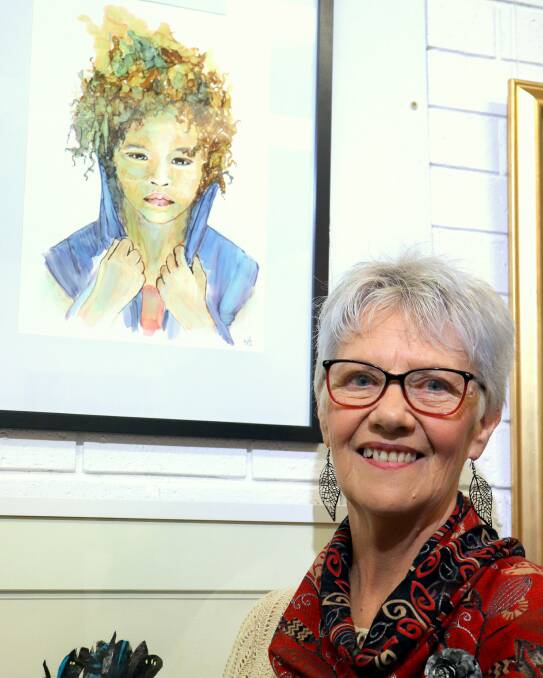 MACS vice president, Margi O'Connor, with her painting, "Attitude". Ms O'Connor was a finalist for the River of Art 2019 Art Prize showing at the SoART Gallery.