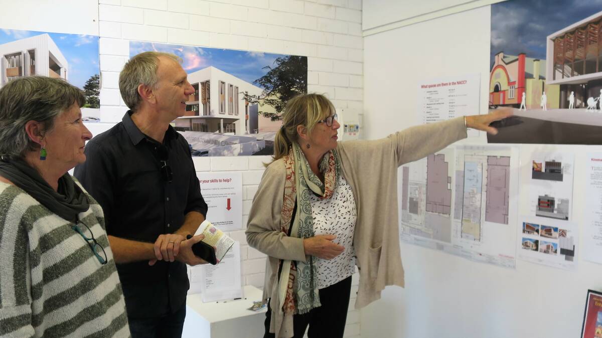 South East Arts General Manager Andrew Gray, delighted to see plans for
the Narooma Arts and Community Centre. With him are School of Arts committee
members Anne McCusker (left) and Joy Macfarlane.