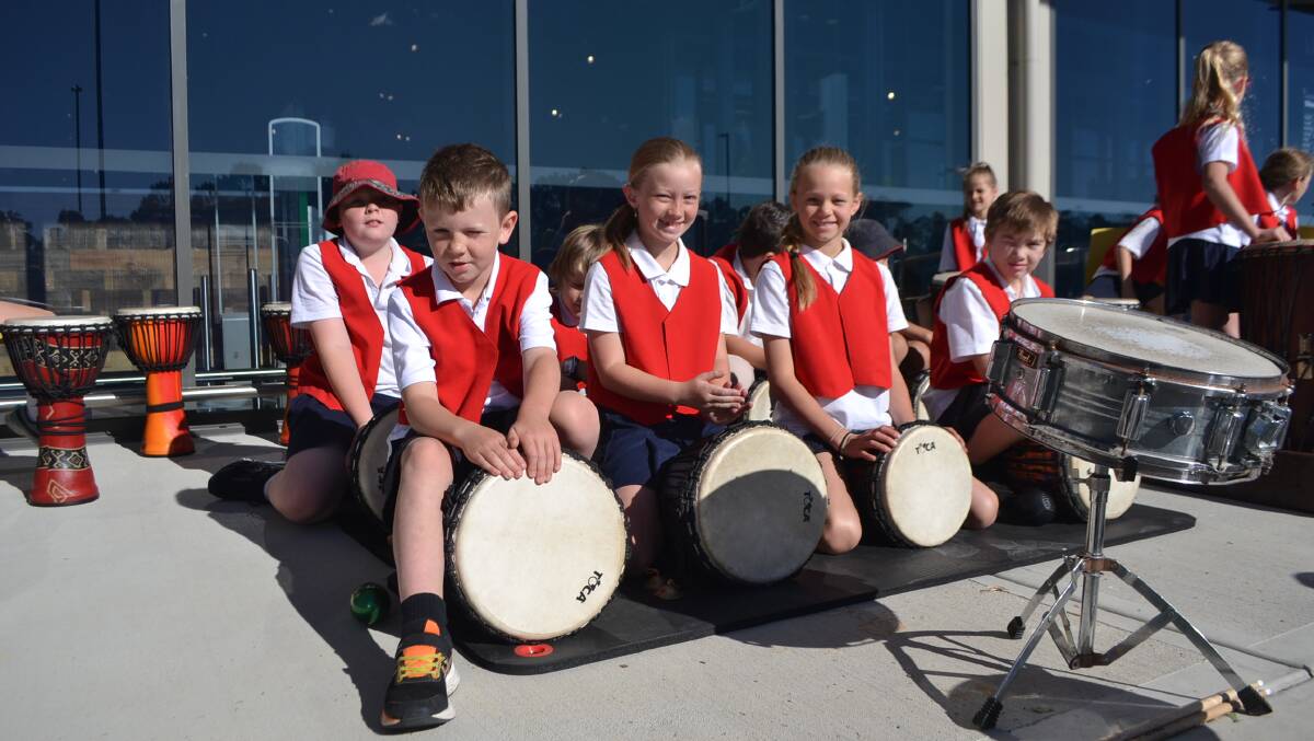 Narooma Public School drum and rhythm group perform at the grand opening of the Narooma Woolworths store on Wednesday, November 13. 