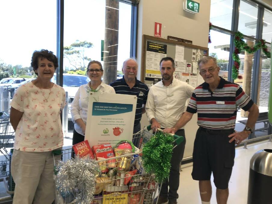 Anne, Julie (Horizon Bank manager), Mike, Michael (Woolworths manager)
and Bill with donations.
