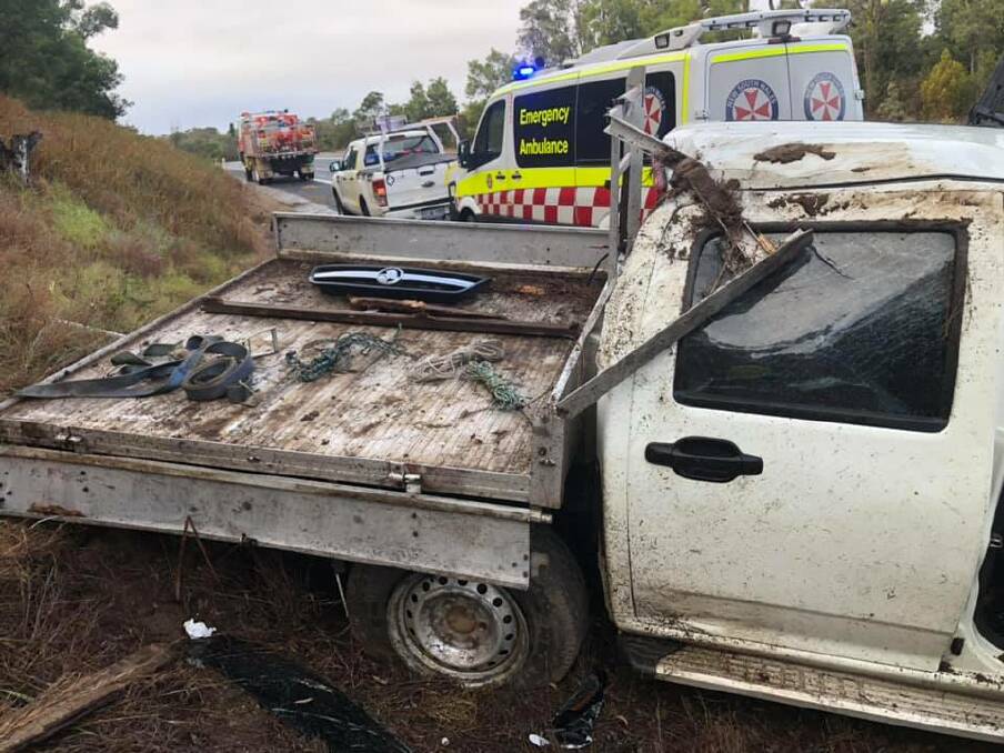 A white ute rolled when driving on wet road on Saturday, July 6. Picture: Moruya Fire and Rescue Facebook page. 