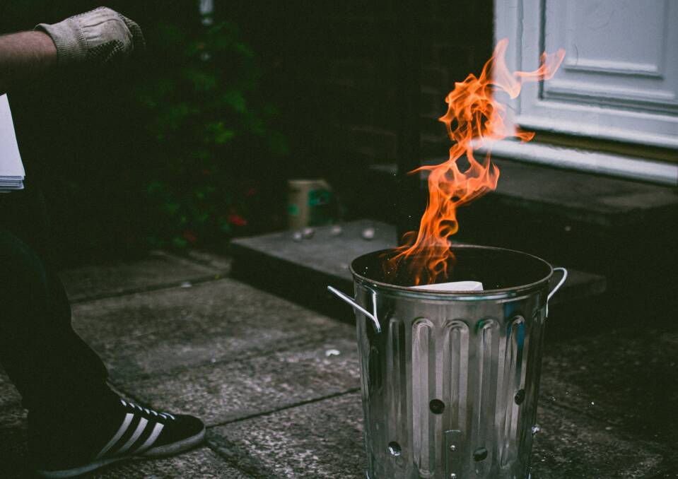 Burning rubbish and green vegetation is not permitted in residential areas. Image: Pexels.
