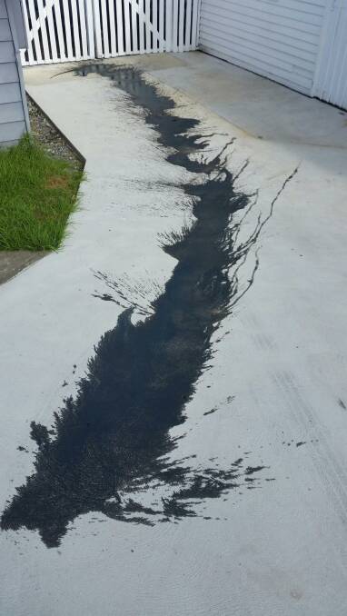 The driveway of Mal's Slipway vandalised with oil. 
