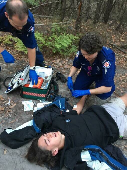 Paramedics assisting Darcy McKay.