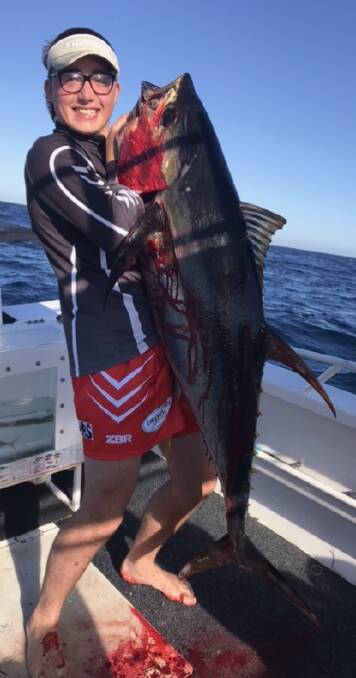 Great size: Narooma Sport and Gamefishing Club member Jake Mikolic with a yellowfin tuna.