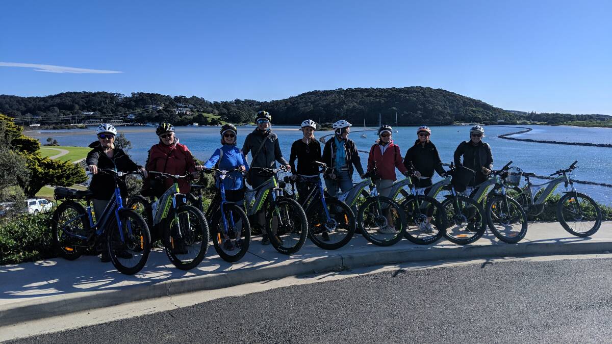 Eurobodalla Shire Council tourism staff enjoy an e-bike tour at Narooma. 